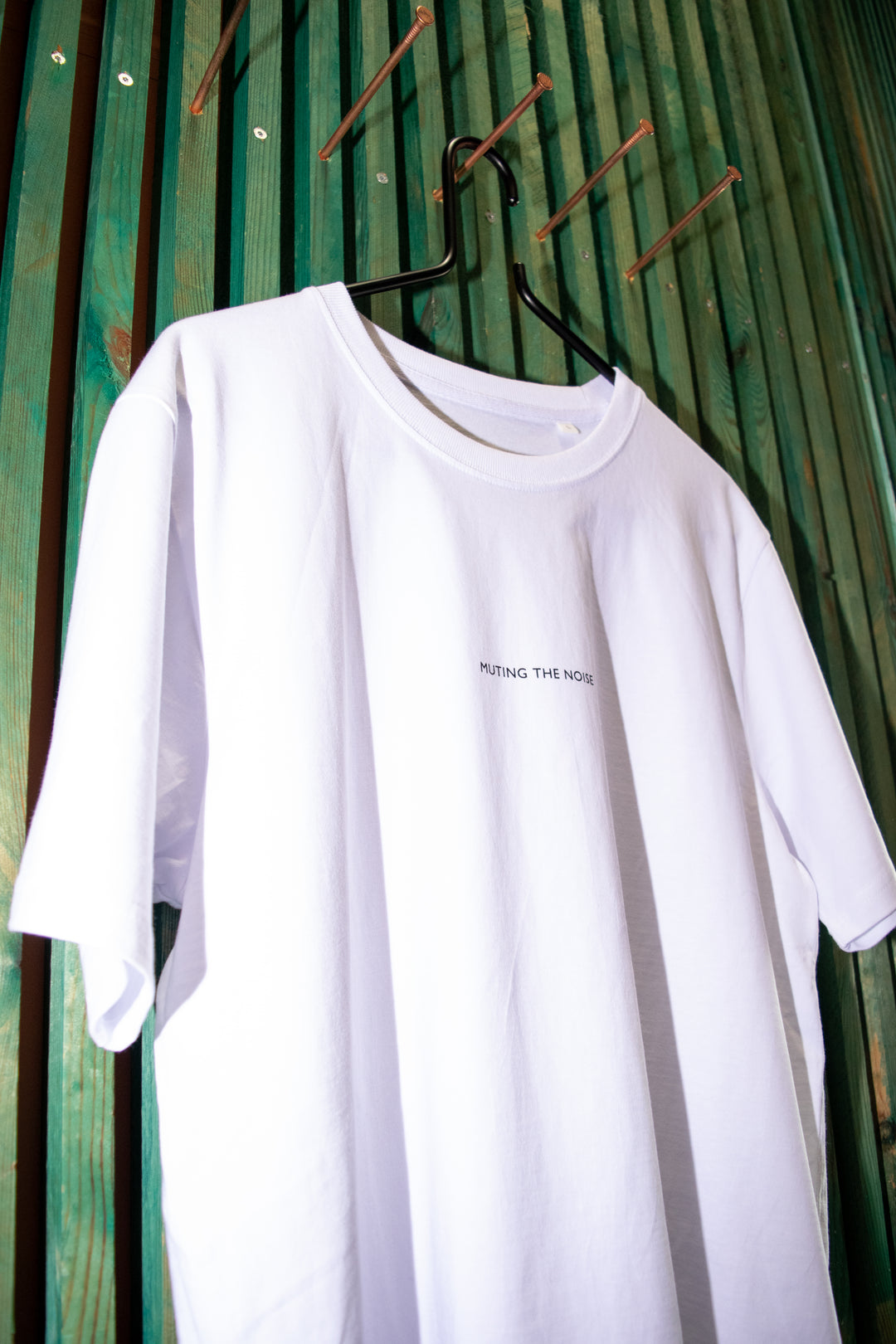 Muting The Noise T-Shirt 2026