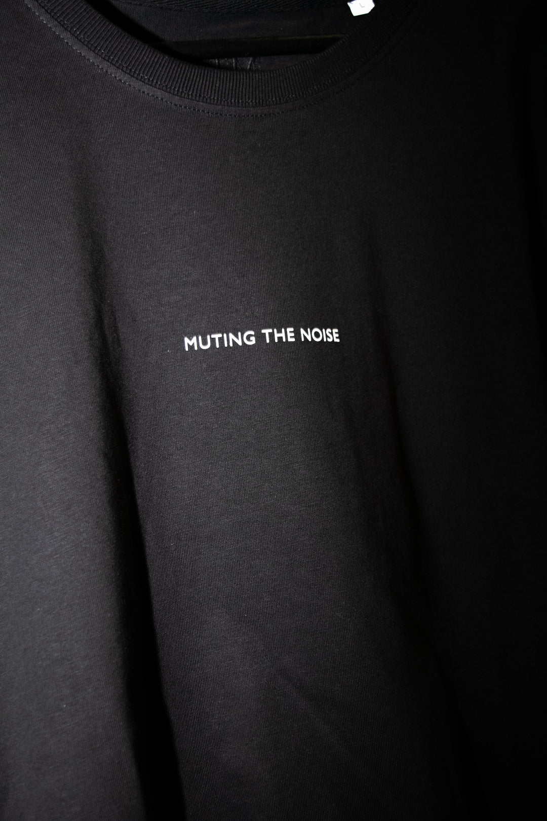 Muting The Noise T-Shirt 2026